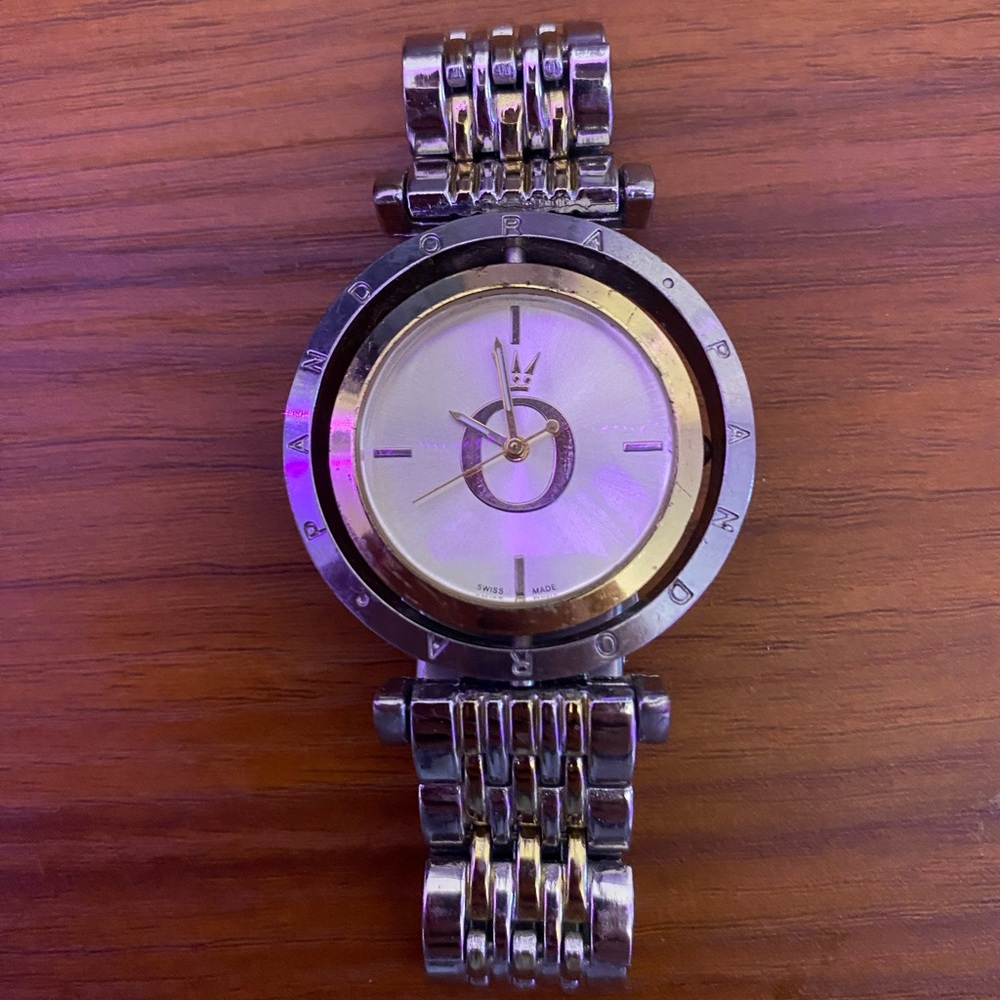 Women's 30mm silver tone watch with black face and leather band.